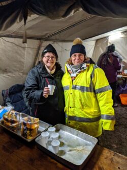 Linda and Shirley serving soup during night hike
